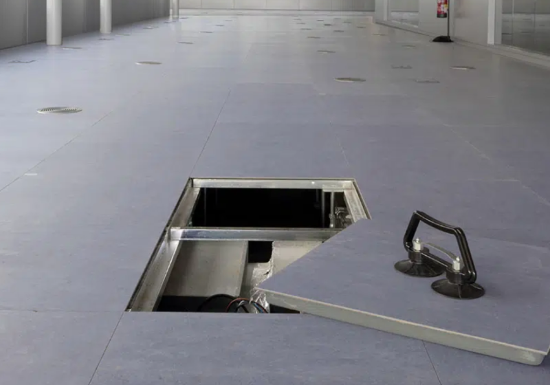 Data center raised floor panel access point