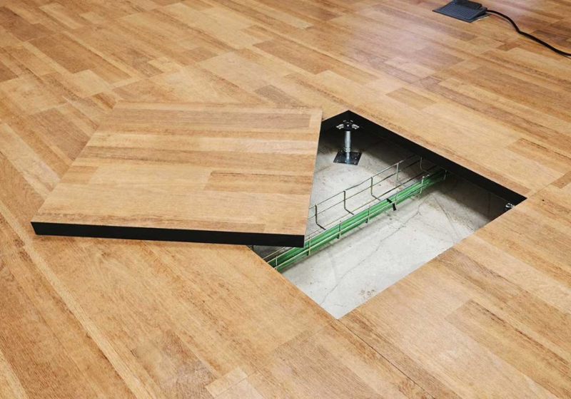 Raised access floor panel with cable management underneath